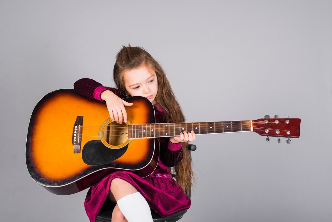 https://ru.freepik.com/free-photo/little-girl-playing-acoustic-guitar_4183173.htm#fromView=search&page=1&position=4&uuid=5e01d89a-ff95-470b-b42d-ef1f1e697e6d